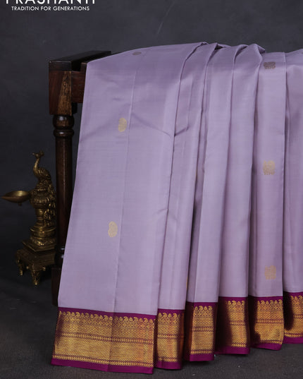 Pure kanchipuram silk saree grey and purple with annam & Paisley zari woven buttas and zari woven korvai border