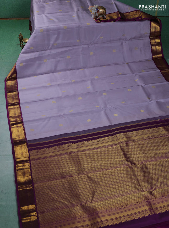 Pure kanchipuram silk saree grey and purple with annam & Paisley zari woven buttas and zari woven korvai border