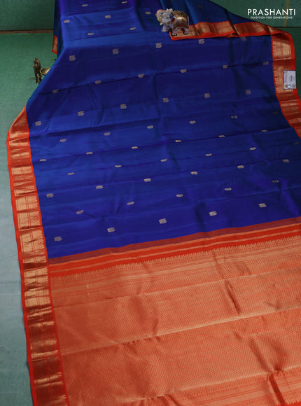 Pure kanchipuram silk saree blue and orange with annam & Paisley zari woven buttas and zari woven korvai border