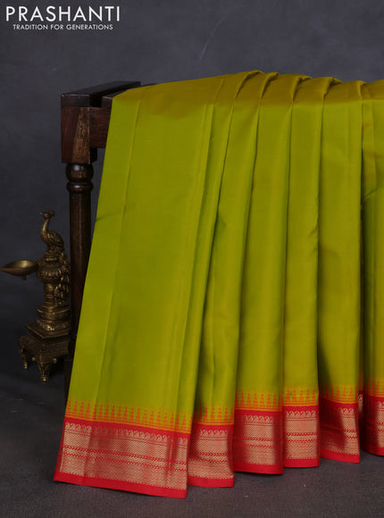 Pure kanchipuram silk saree lime green and red with plain body and temple design zari woven border