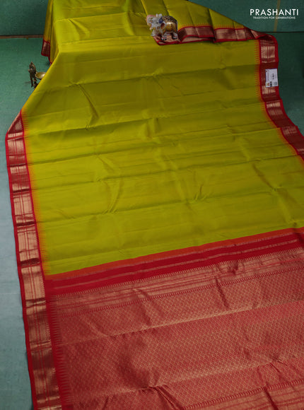 Pure kanchipuram silk saree lime green and red with plain body and temple design zari woven border