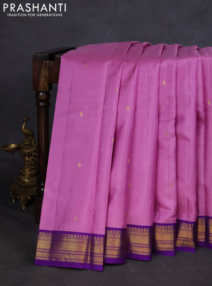 Pure kanchipuram silk saree lotus pink and violet with zari woven buttas and zari woven korvai border