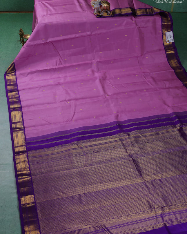 Pure kanchipuram silk saree lotus pink and violet with zari woven buttas and zari woven korvai border