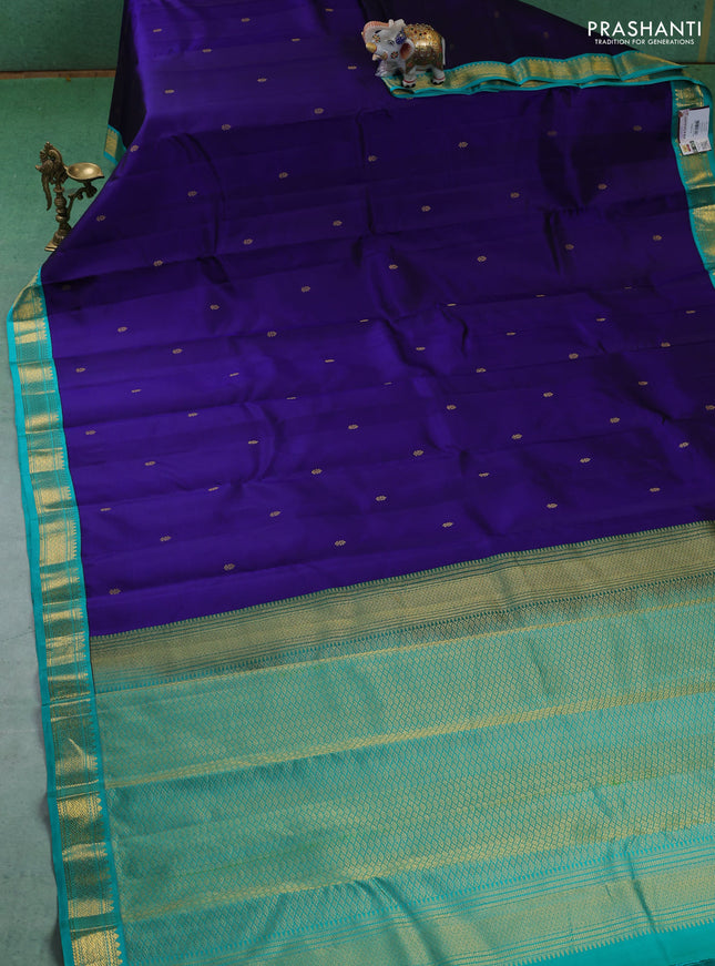 Pure kanchipuram silk saree blue and teal blue with zari woven buttas and zari woven korvai border