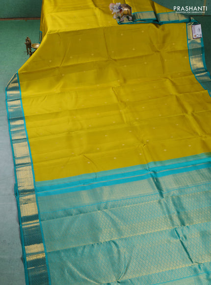 Pure kanchipuram silk saree lime yellow and teal blue with zari woven buttas and zari woven korvai border