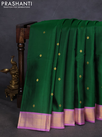 Pure kanchipuram silk saree green and lavender with zari woven buttas and zari woven korvai border