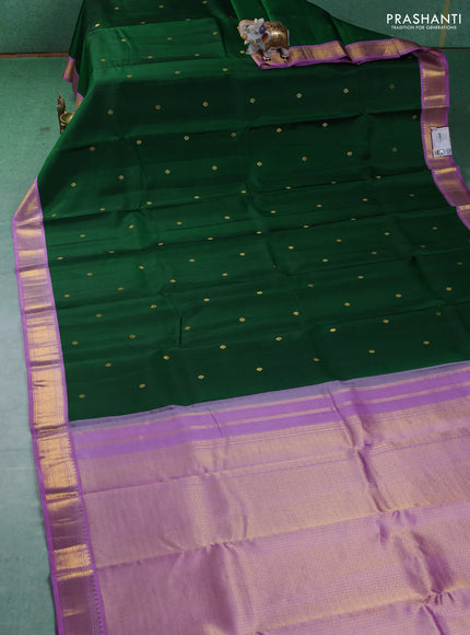 Pure kanchipuram silk saree green and lavender with zari woven buttas and zari woven korvai border