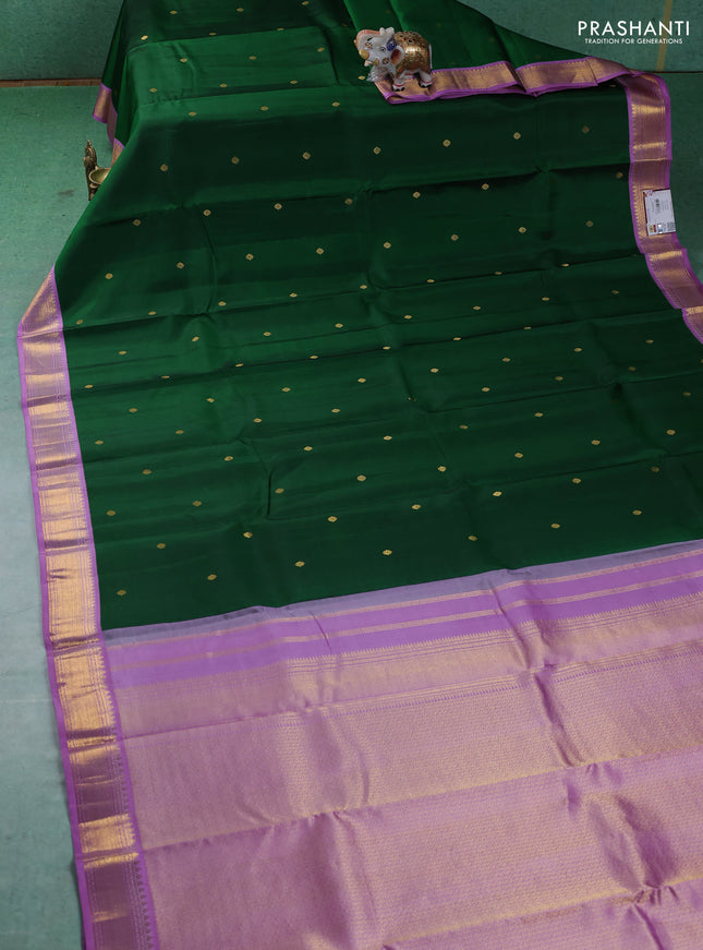 Pure kanchipuram silk saree green and lavender with zari woven buttas and zari woven korvai border