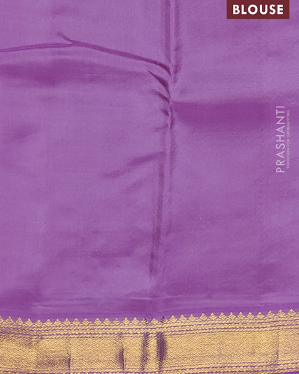Pure kanchipuram silk saree green and lavender with zari woven buttas and zari woven korvai border