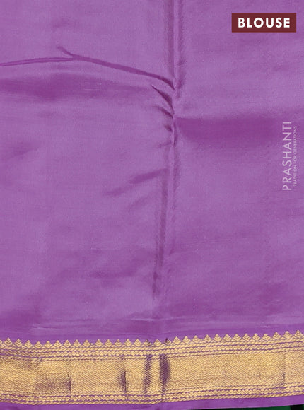 Pure kanchipuram silk saree green and lavender with zari woven buttas and zari woven korvai border