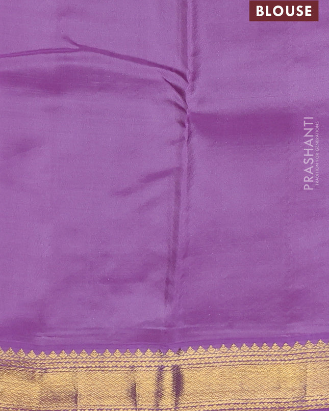 Pure kanchipuram silk saree green and lavender with zari woven buttas and zari woven korvai border