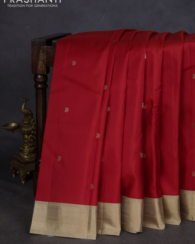 Pure kanchipuram silk saree red and sandal with paisley zari woven buttas and zari woven korvai border
