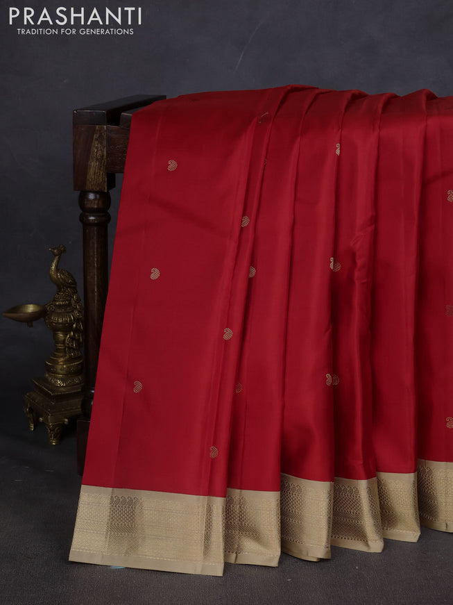 Pure kanchipuram silk saree red and sandal with paisley zari woven buttas and zari woven korvai border