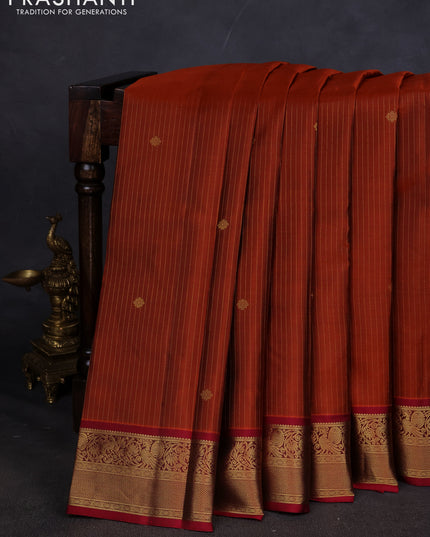 Pure kanchipuram silk saree rust shade and maroon with allover zari weaves and zari woven korvai border