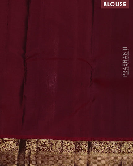 Pure kanchipuram silk saree rust shade and maroon with allover zari weaves and zari woven korvai border