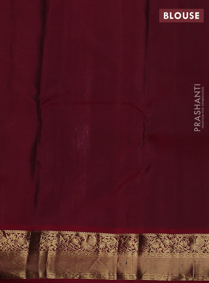 Pure kanchipuram silk saree rust shade and maroon with allover zari weaves and zari woven korvai border