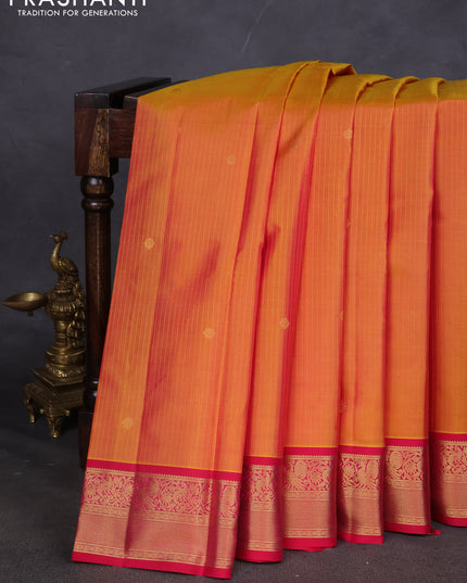 Pure kanchipuram silk saree dual shade of mustard yellow and pink with allover zari weaves and zari woven korvai border