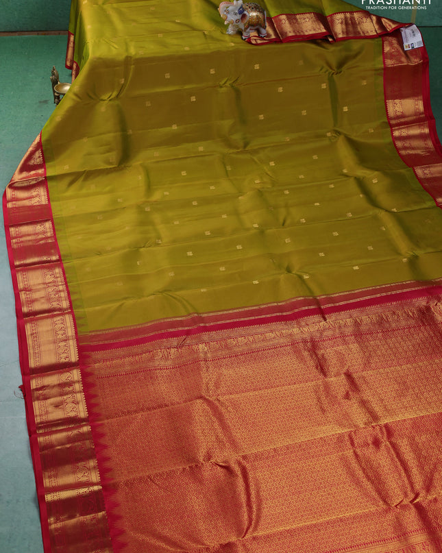 Pure kanchipuram silk saree lime green and red with annam zari woven buttas and zari woven korvai border