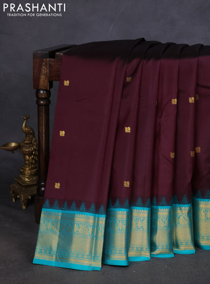 Pure kanchipuram silk saree deep wine and teal blue with annam zari woven buttas and zari woven korvai border
