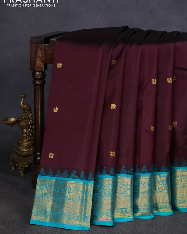 Pure kanchipuram silk saree deep wine and teal blue with annam zari woven buttas and zari woven korvai border