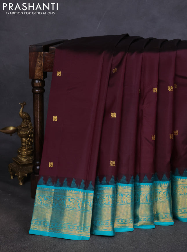 Pure kanchipuram silk saree deep wine and teal blue with annam zari woven buttas and zari woven korvai border