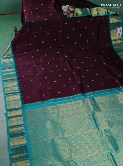Pure kanchipuram silk saree deep wine and teal blue with annam zari woven buttas and zari woven korvai border