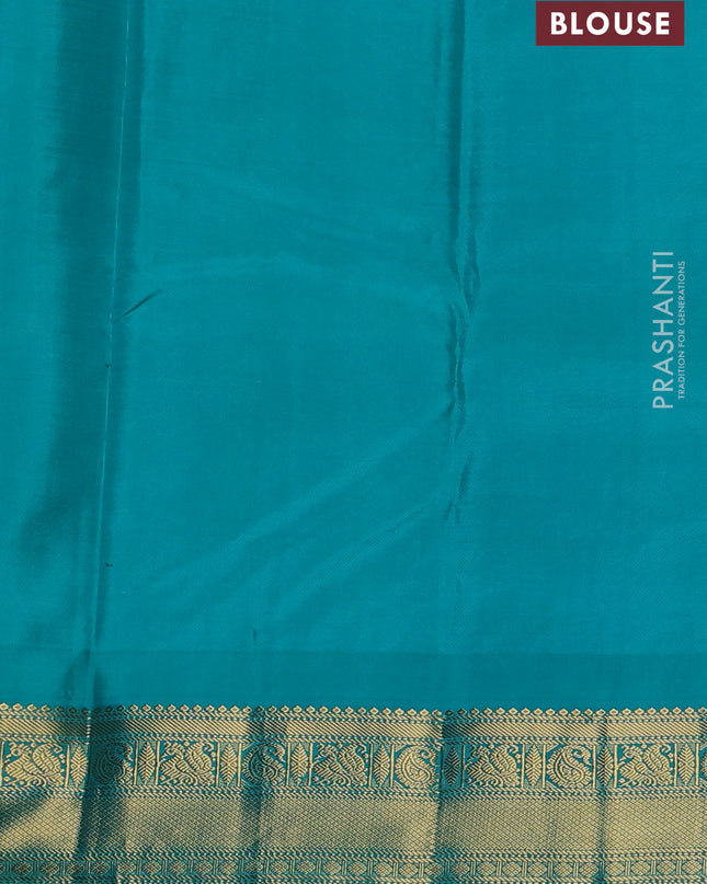 Pure kanchipuram silk saree deep wine and teal blue with annam zari woven buttas and zari woven korvai border