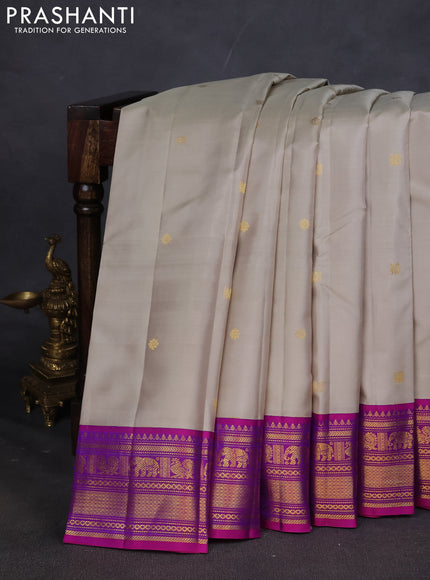Pure kanchipuram silk saree grey and purple with zari woven buttas and zari woven korvai border