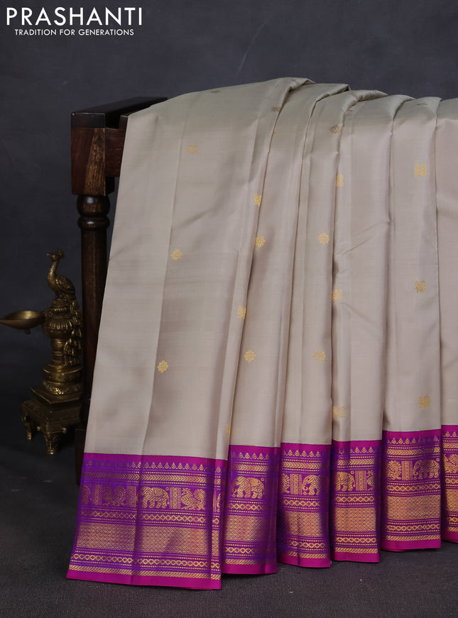 Pure kanchipuram silk saree grey and purple with zari woven buttas and zari woven korvai border