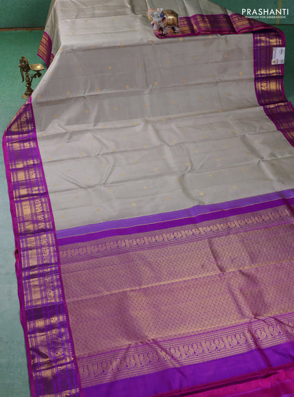 Pure kanchipuram silk saree grey and purple with zari woven buttas and zari woven korvai border
