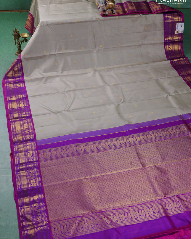 Pure kanchipuram silk saree grey and purple with zari woven buttas and zari woven korvai border