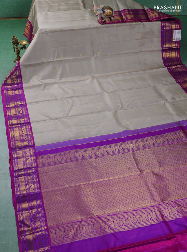 Pure kanchipuram silk saree grey and purple with zari woven buttas and zari woven korvai border