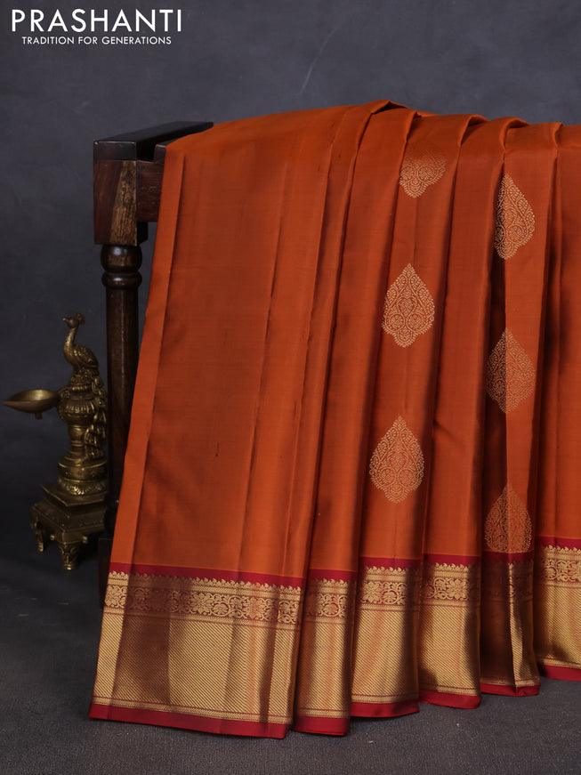 Pure kanchipuram silk saree rustic orange and maroon with zari woven buttas and zari woven korvai border