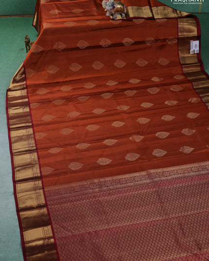 Pure kanchipuram silk saree rustic orange and maroon with zari woven buttas and zari woven korvai border