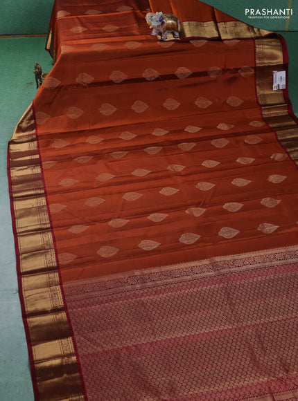Pure kanchipuram silk saree rustic orange and maroon with zari woven buttas and zari woven korvai border