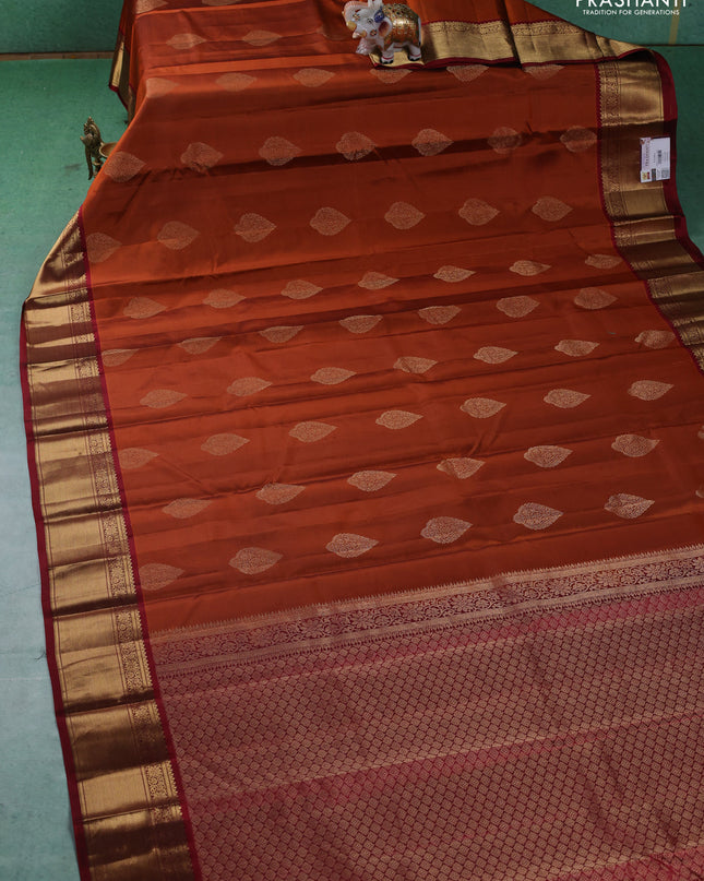 Pure kanchipuram silk saree rustic orange and maroon with zari woven buttas and zari woven korvai border