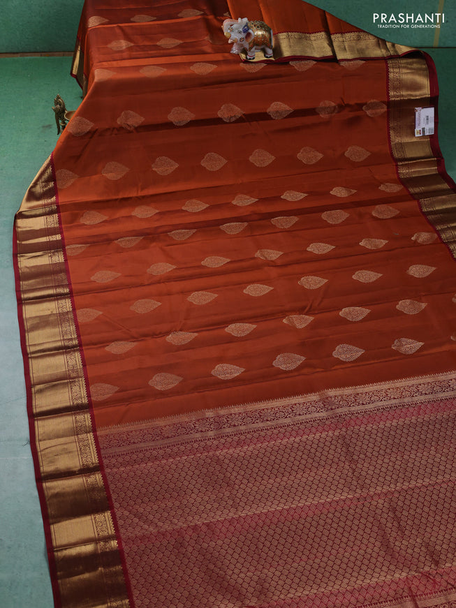 Pure kanchipuram silk saree rustic orange and maroon with zari woven buttas and zari woven korvai border