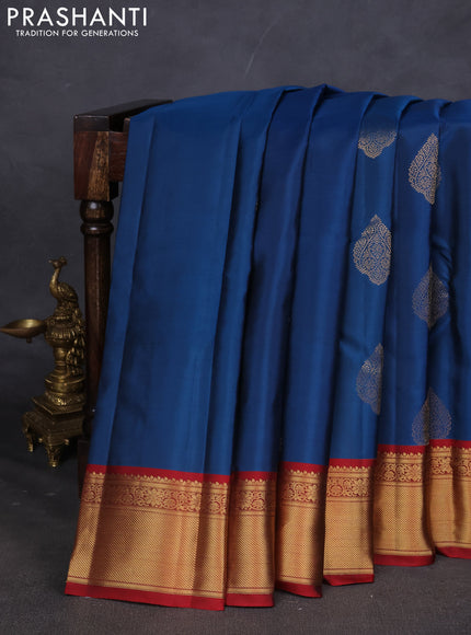 Pure kanchipuram silk saree peacock blue and maroon with zari woven buttas and zari woven korvai border