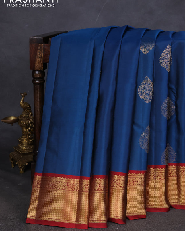 Pure kanchipuram silk saree peacock blue and maroon with zari woven buttas and zari woven korvai border