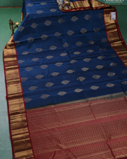Pure kanchipuram silk saree peacock blue and maroon with zari woven buttas and zari woven korvai border