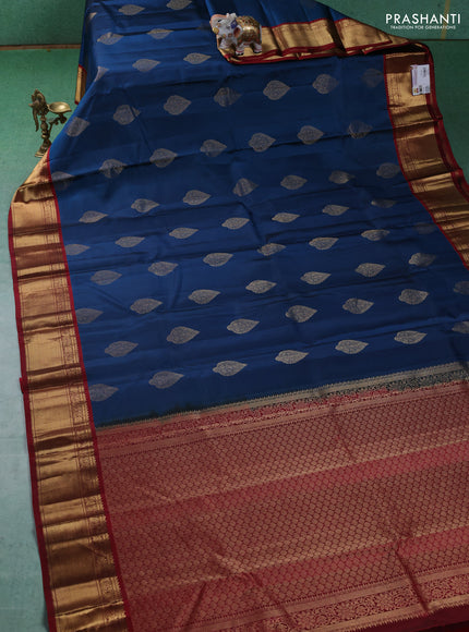 Pure kanchipuram silk saree peacock blue and maroon with zari woven buttas and zari woven korvai border