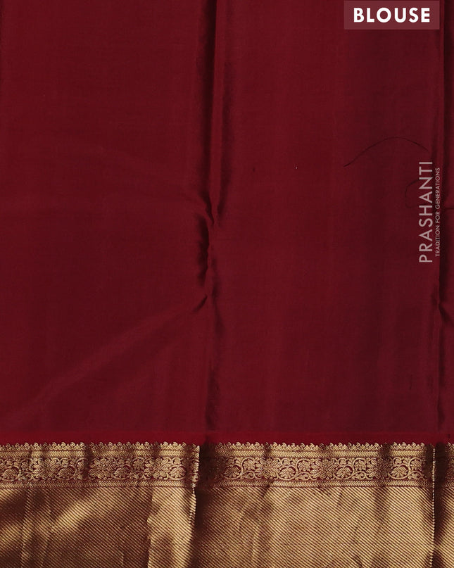 Pure kanchipuram silk saree peacock blue and maroon with zari woven buttas and zari woven korvai border