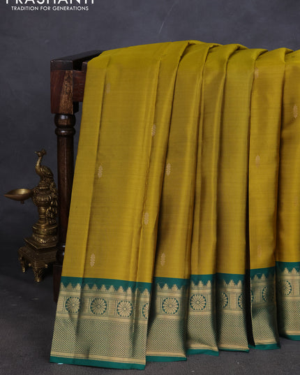 Pure kanchipuram silk saree mehendi green and green with zari woven buttas and zari woven border