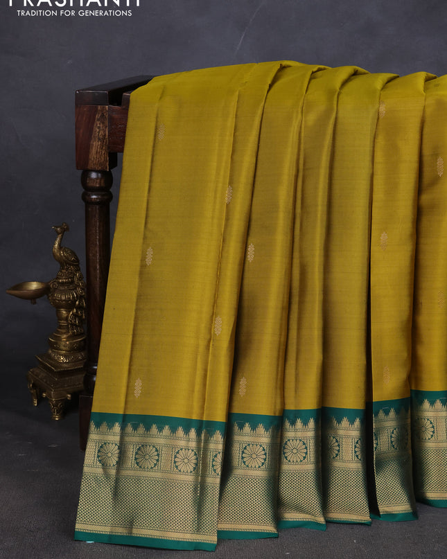Pure kanchipuram silk saree mehendi green and green with zari woven buttas and zari woven border