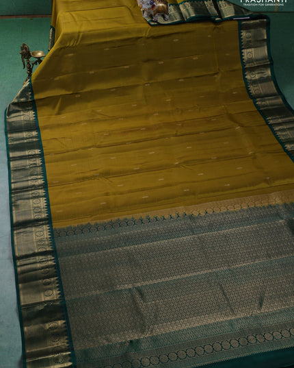 Pure kanchipuram silk saree mehendi green and green with zari woven buttas and zari woven border