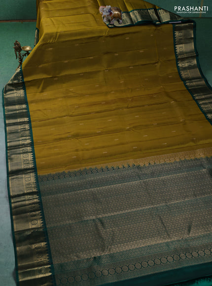 Pure kanchipuram silk saree mehendi green and green with zari woven buttas and zari woven border