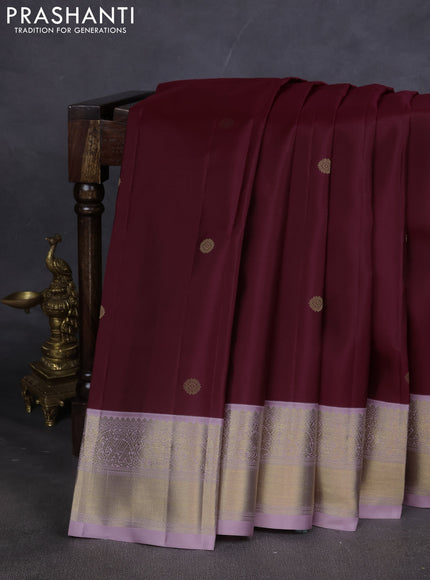 Pure kanchipuram silk saree maroon and pastel lavender with zari woven buttas and zari woven korvai border
