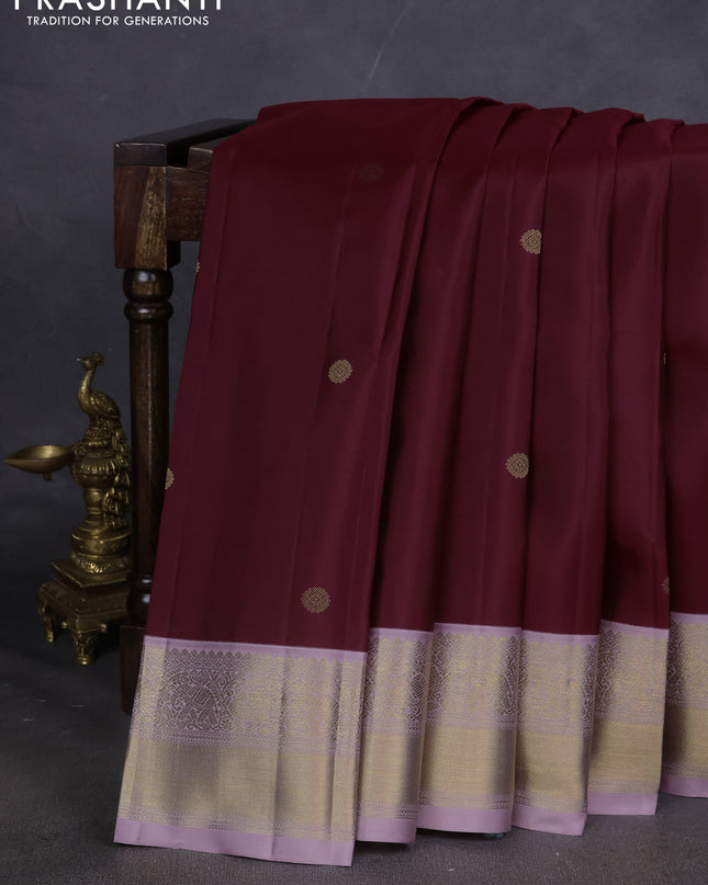 Pure kanchipuram silk saree maroon and pastel lavender with zari woven buttas and zari woven korvai border