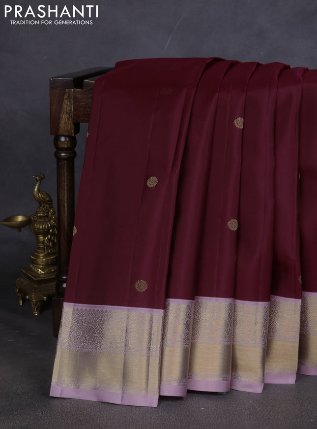 Pure kanchipuram silk saree maroon and pastel lavender with zari woven buttas and zari woven korvai border