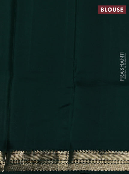 Pure kanchipuram silk saree off white and dark green with plain body and temple design zari woven border